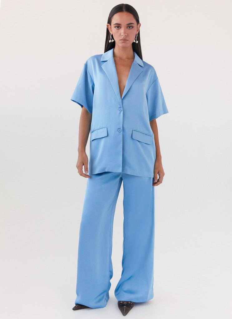 Womens Brinkley Oversized Satin Shirt in the colour Sky Blue in front of a light grey background