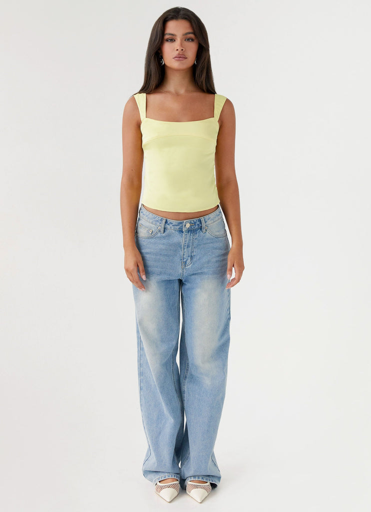 Womens Lylah Satin Top in the colour Yellow in front of a light grey background