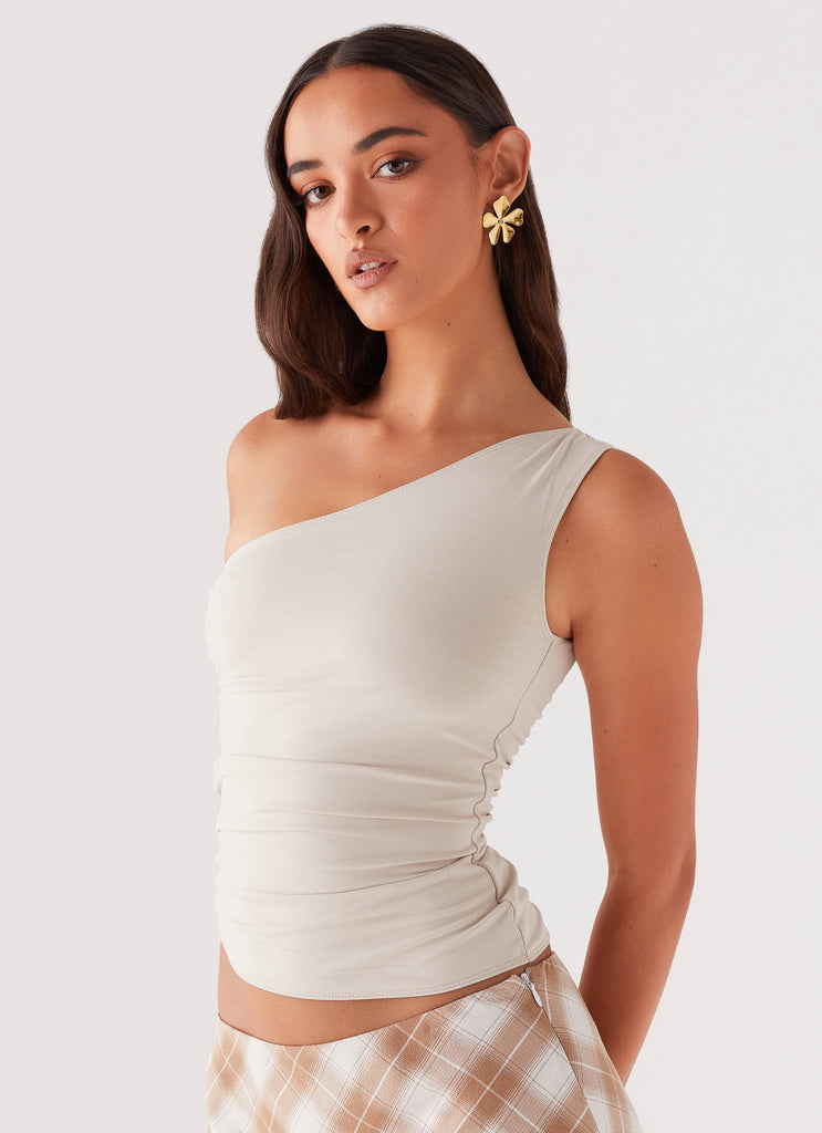 Womens Lenny One Shoulder Top in the colour Ecru in front of a light grey background