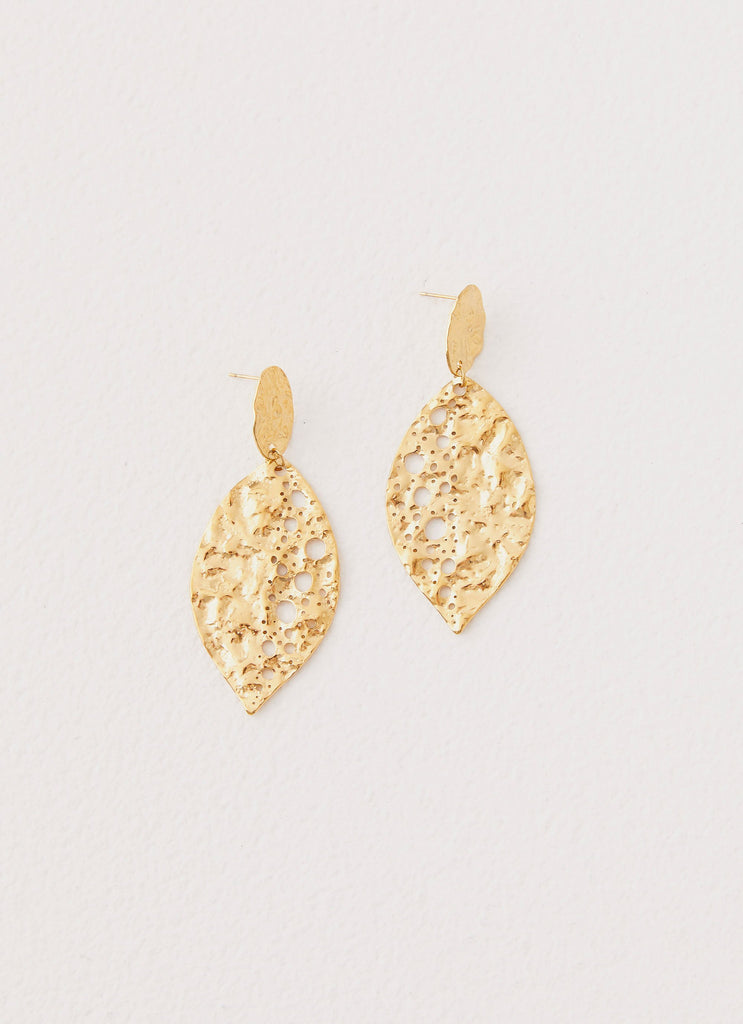 Womens Palm Earrings in the colour Gold in front of a light grey background