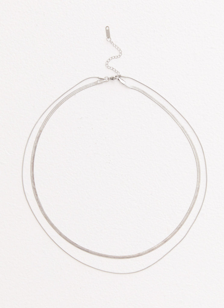 Womens Ria Necklace in the colour Silver in front of a light grey background