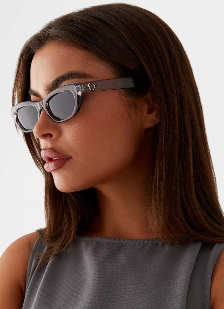 Womens Lavance Sunglasses in the colour Grey in front of a light grey background