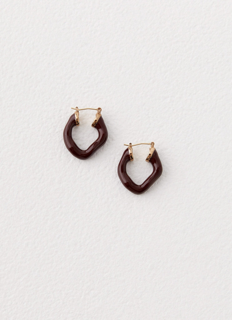 Womens Maddie Hoop Earrings in the colour Brown in front of a light grey background