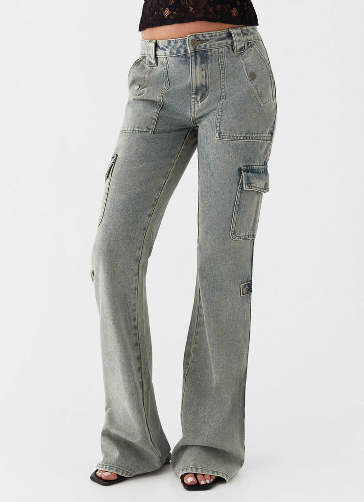 Womens Zephee Flare Jeans in the colour Washed Denim in front of a light grey background