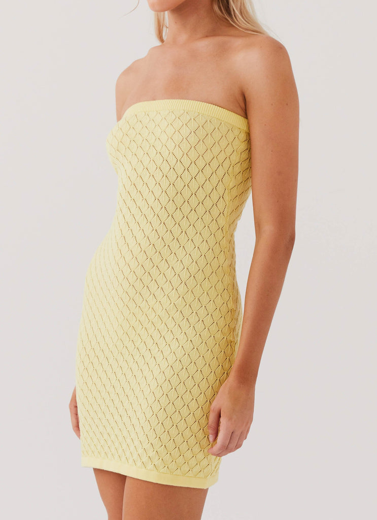 Womens Lifeline Knit Tube Mini Dress in the colour Lemon in front of a light grey background