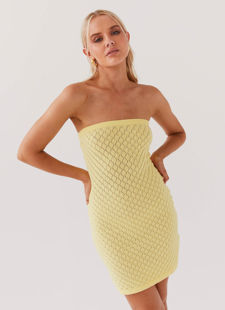 Womens Lifeline Knit Tube Mini Dress in the colour Lemon in front of a light grey background