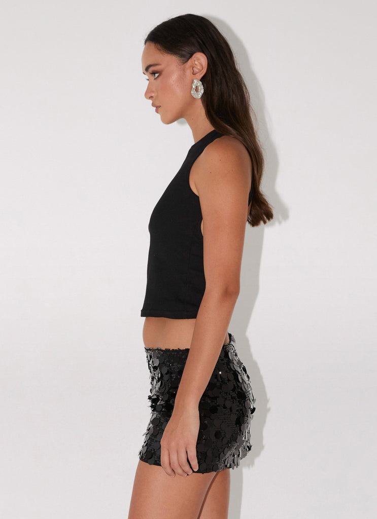 Womens Champagne Chic Sequin Mini Skirt in the colour Black in front of a light grey background