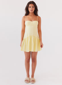 Womens Endless Summer Mini Dress in the colour Canary in front of a light grey background