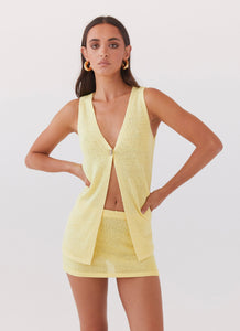 Womens Capri Glow Knit Top in the colour Canary in front of a light grey background