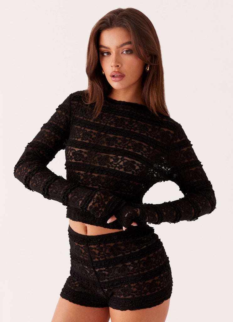 Womens Northie Lace Long Sleeve Top in the colour Black in front of a light grey background