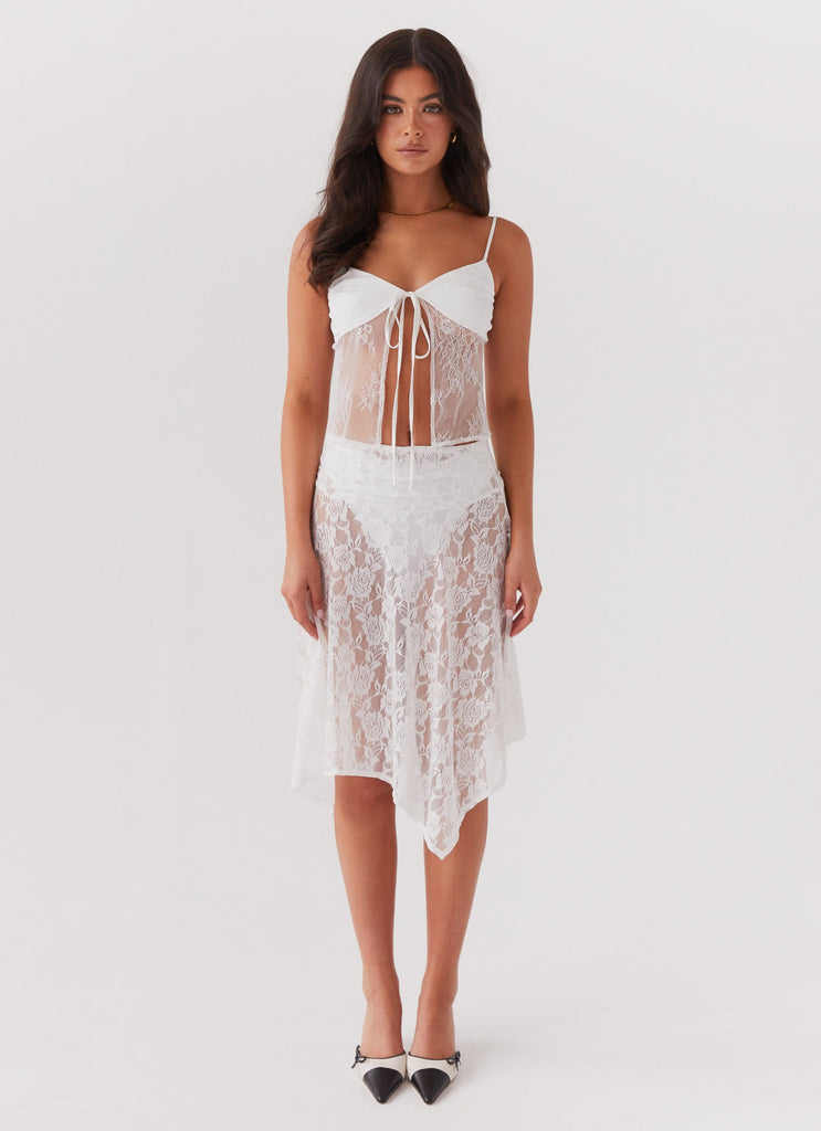 Womens Deja Vu Lace Tie Top in the colour White in front of a light grey background