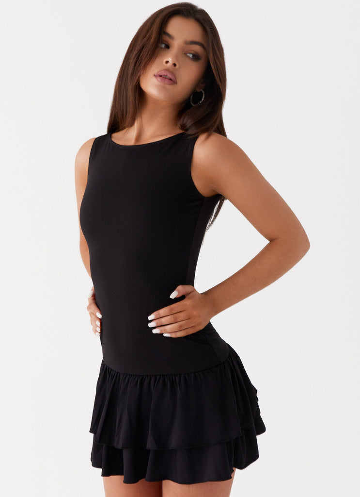 Womens Rhiannon Frill Mini Dress in the colour Black in front of a light grey background