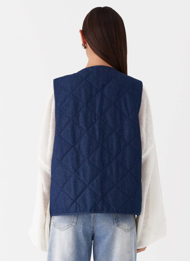 Womens Kennedy Denim Vest in the colour Indigo in front of a light grey background