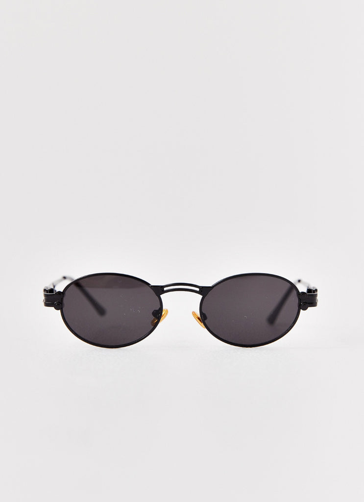 Womens Starbeam Sunglasses in the colour Black in front of a light grey background