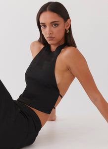 Womens Bree Satin Halterneck Top in the colour Black in front of a light grey background