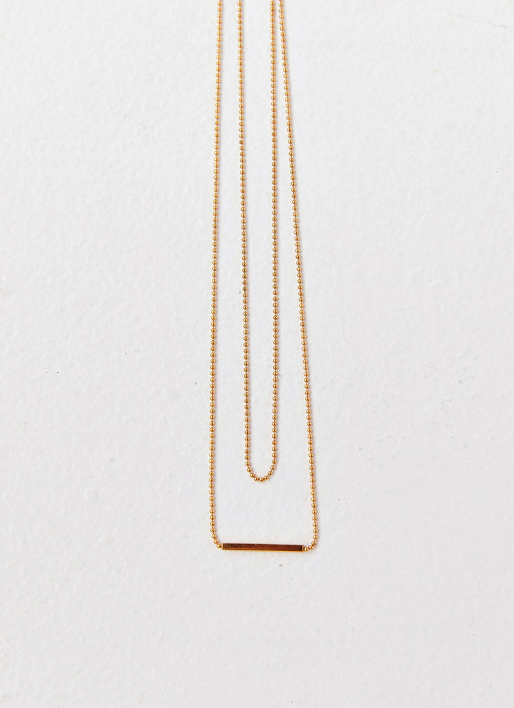 Womens Levant Chain Necklace in the colour Gold in front of a light grey background