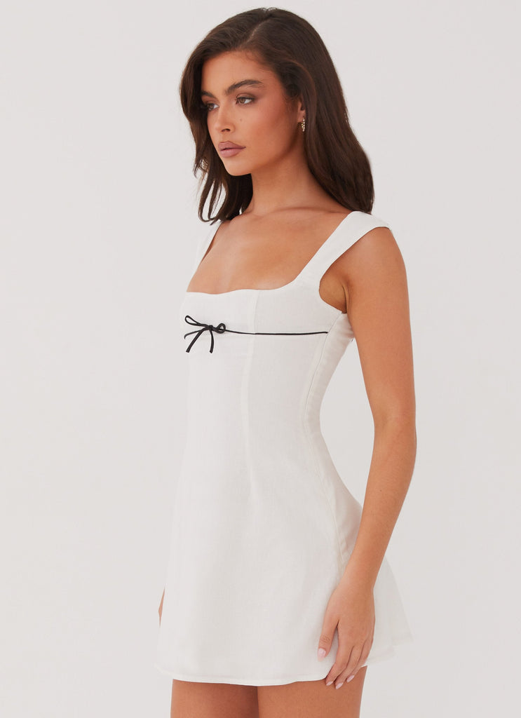 Womens Cadence Mini Dress in the colour White in front of a light grey background