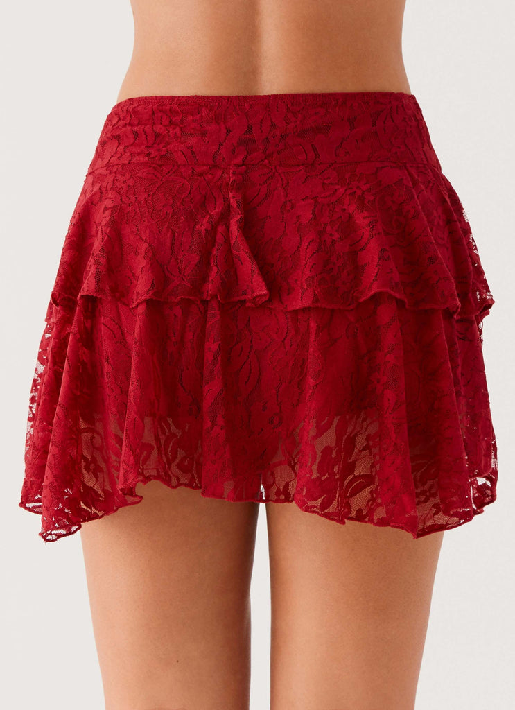 Womens Party All Night Frill Mini Skirt in the colour Maroon in front of a light grey background