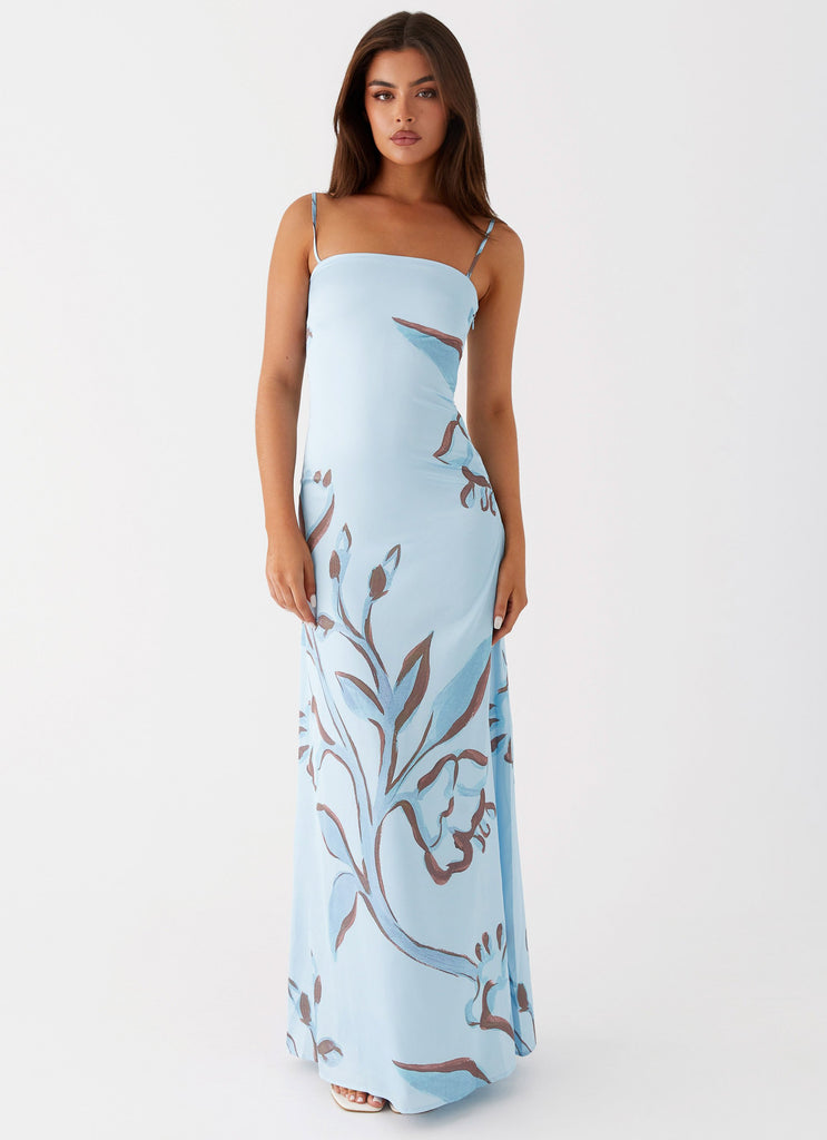 Womens Aster Bloom Maxi Dress in the colour Blue Floral in front of a light grey background