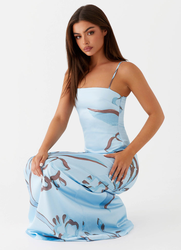 Womens Aster Bloom Maxi Dress in the colour Blue Floral in front of a light grey background