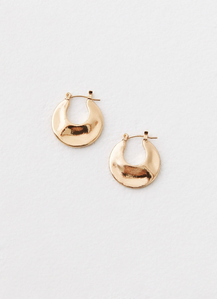 Womens Nobody Else Earrings in the colour Gold in front of a light grey background