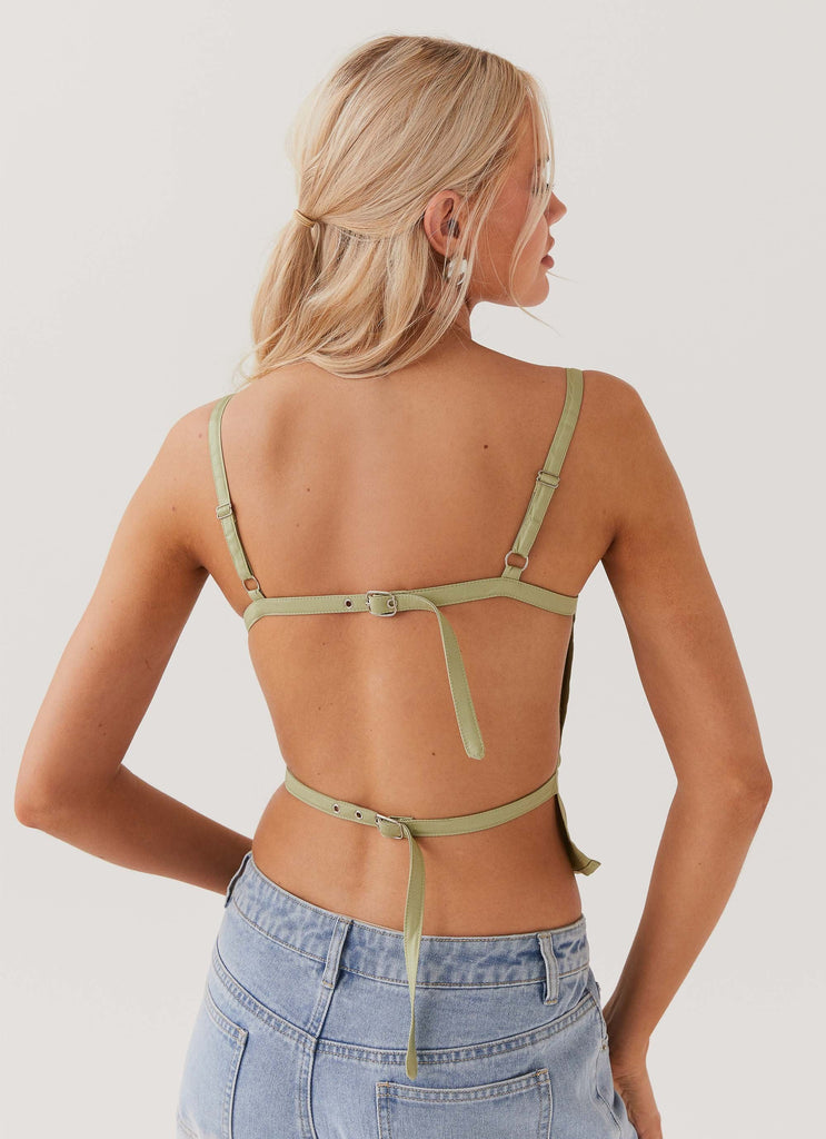 Womens Naomi Backless Top in the colour Sage in front of a light grey background