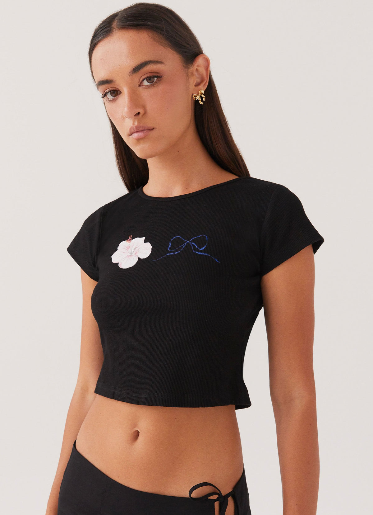 Womens My Turn Baby Tee in the colour Black in front of a light grey background