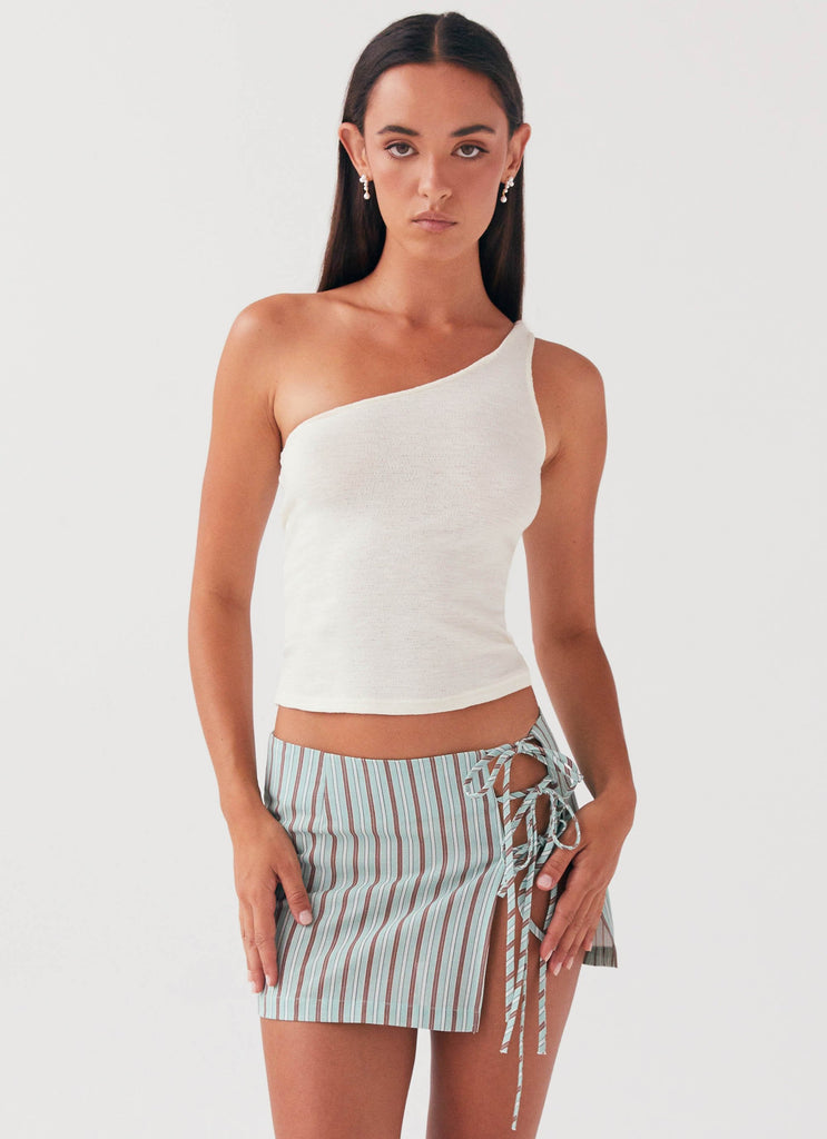 Womens Summer Retreat Mini Skirt in the colour Coastal Stripe in front of a light grey background