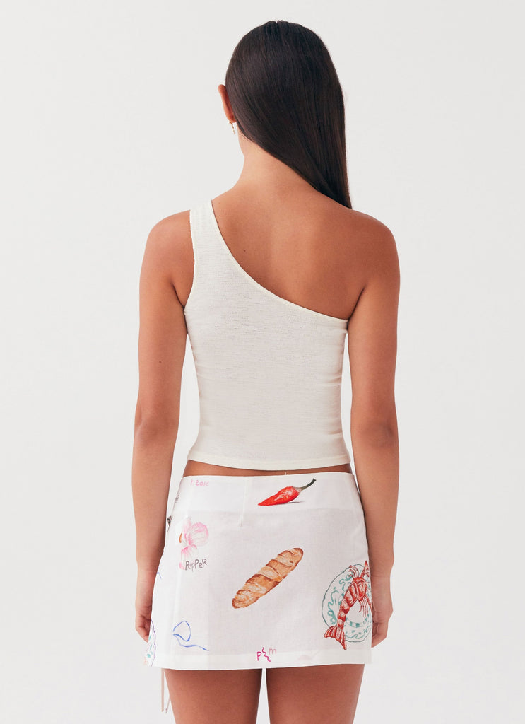 Womens Summer Retreat Mini Skirt in the colour Banchetto in front of a light grey background