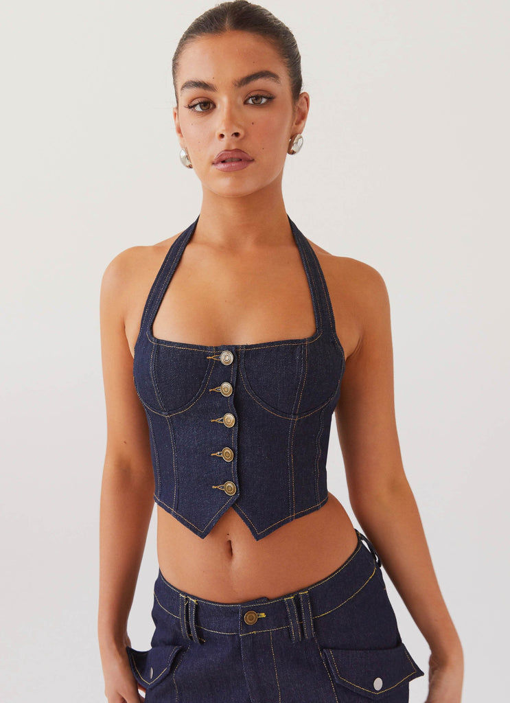 Womens Avari Halterneck Denim Vest in the colour Indigo in front of a light grey background