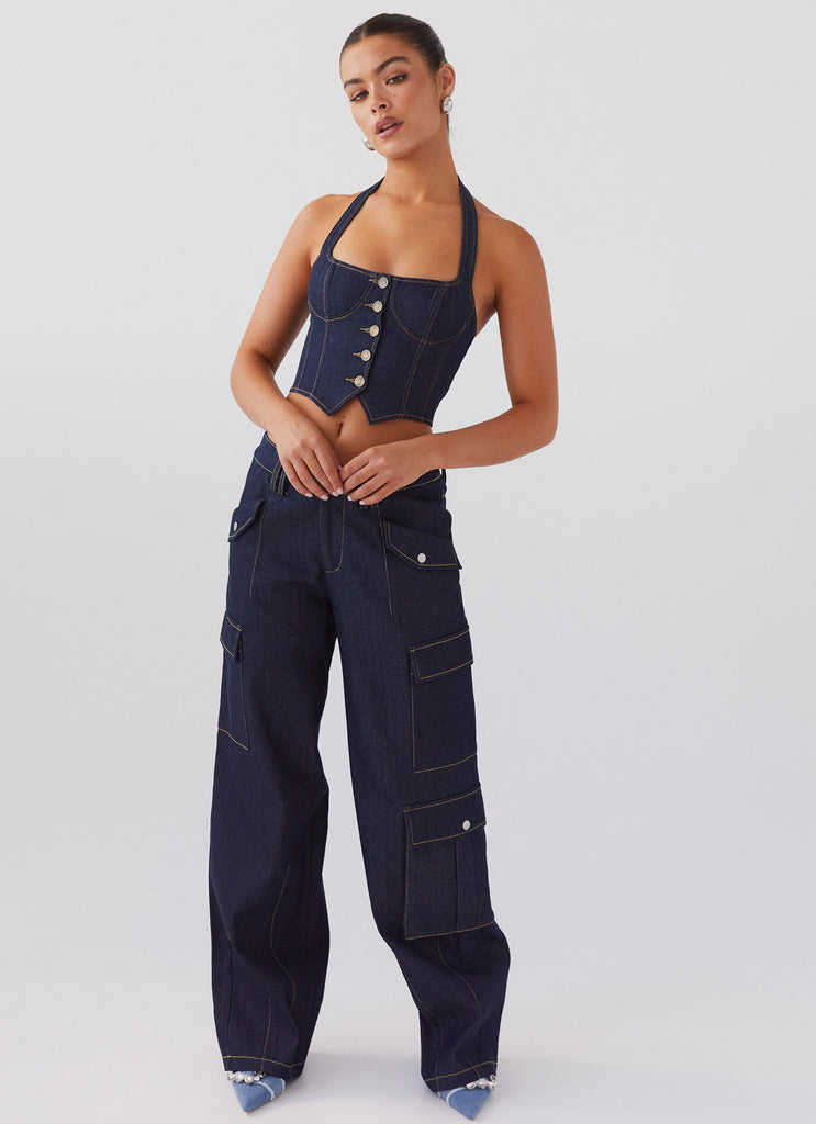 Womens Greedy Denim Cargo Pants in the colour Indigo in front of a light grey background