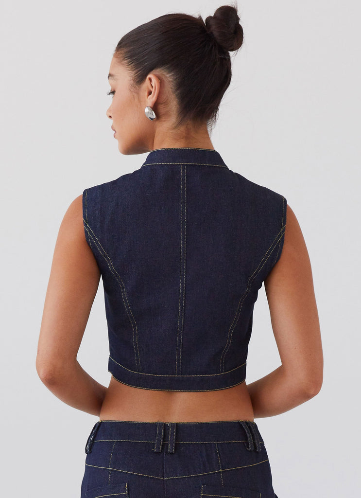 Womens Greedy Denim Buckle Top in the colour Indigo in front of a light grey background