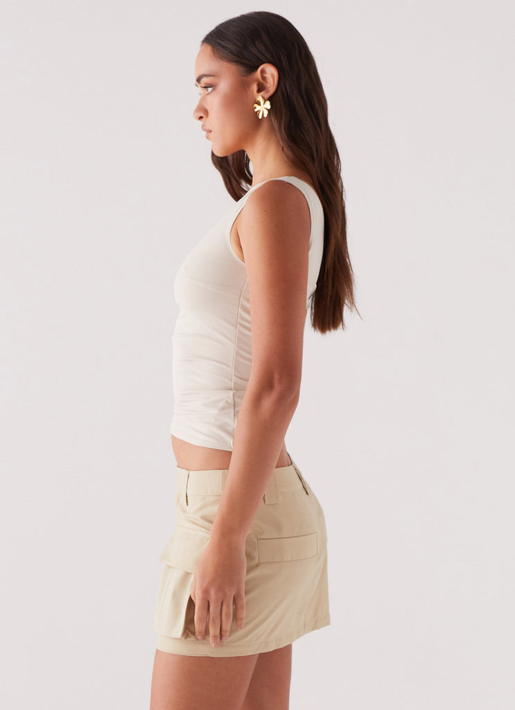 Womens Heart To Heart Cargo Mini Skirt in the colour Beige in front of a light grey background