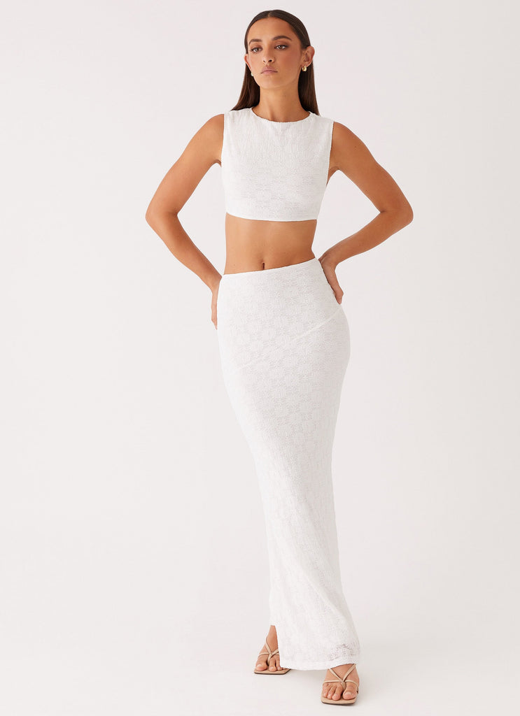 Womens Issey Crop Top in the colour White in front of a light grey background