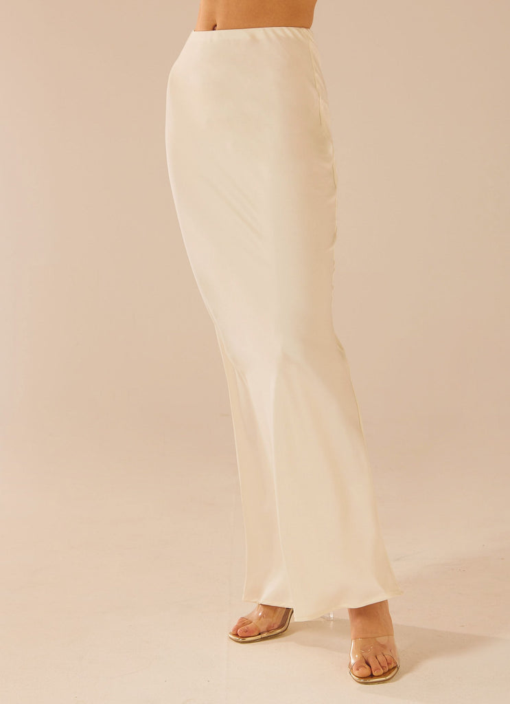 Womens Aria Satin Maxi Skirt in the colour Pearl in front of a light grey background