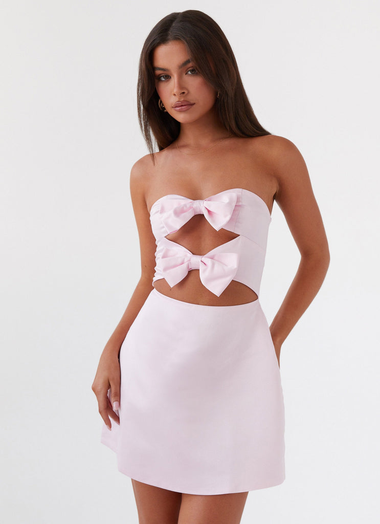 Womens Girl Crush Bow Mini Dress in the colour Pink in front of a light grey background