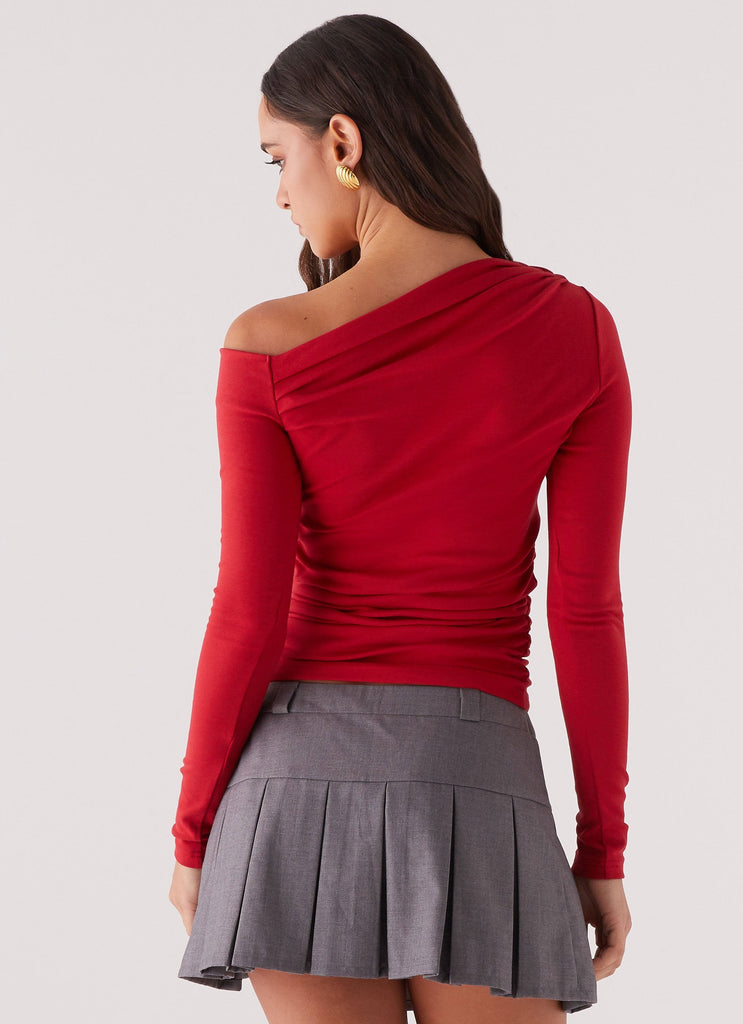 Womens Kiki Long Sleeve Top in the colour Cherry in front of a light grey background