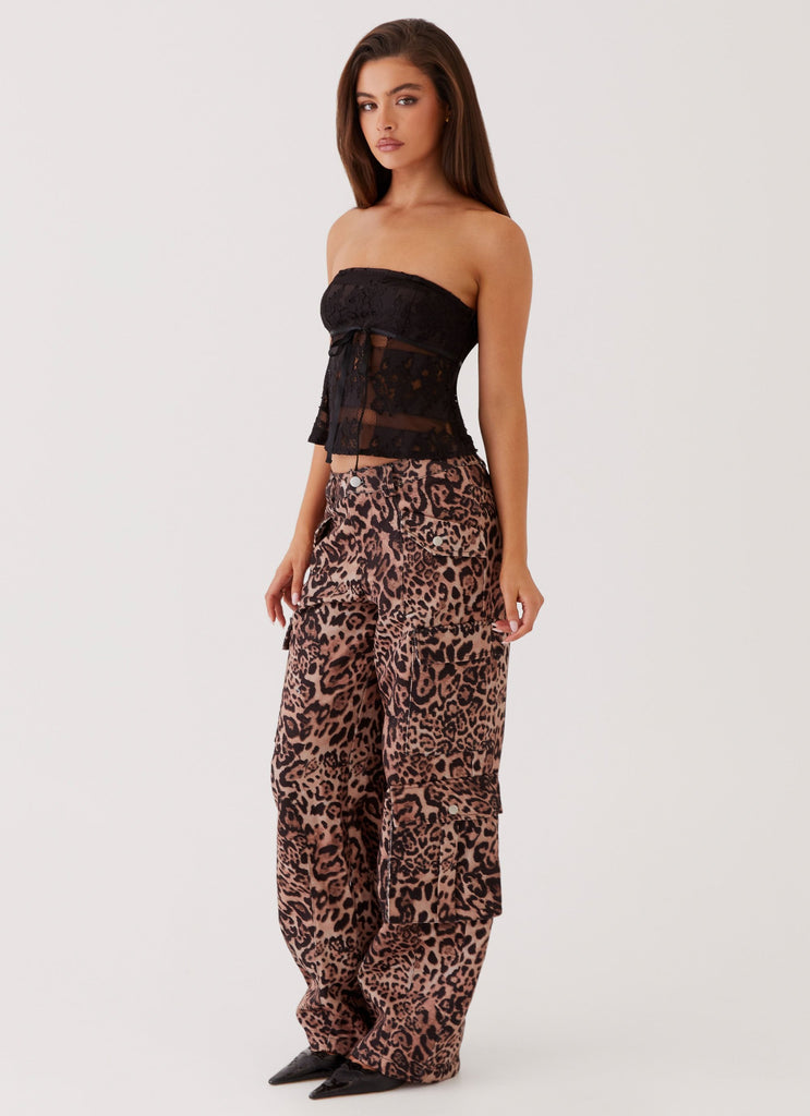 Womens Greedy Cargo Pants in the colour Leopard in front of a light grey background