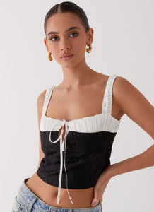 Womens Ryder Bustier Top in the colour Black in front of a light grey background