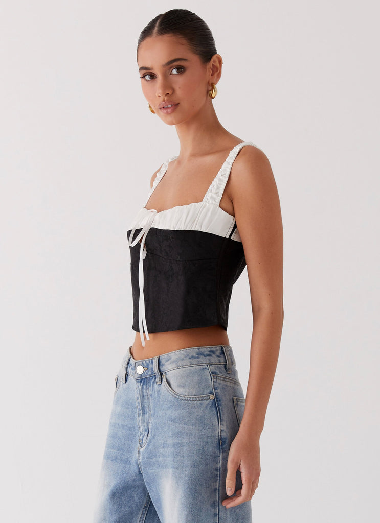 Womens Ryder Bustier Top in the colour Black in front of a light grey background