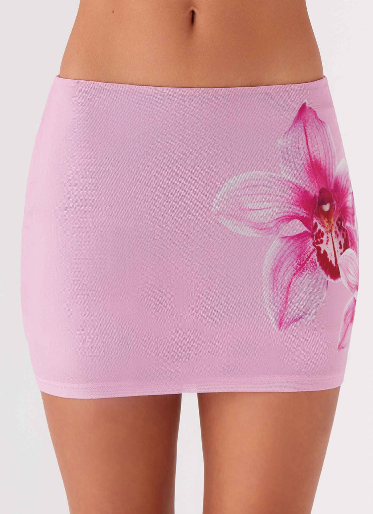 Womens Sunset Bliss Mesh Mini Skirt in the colour Pink Magnolia in front of a light grey background