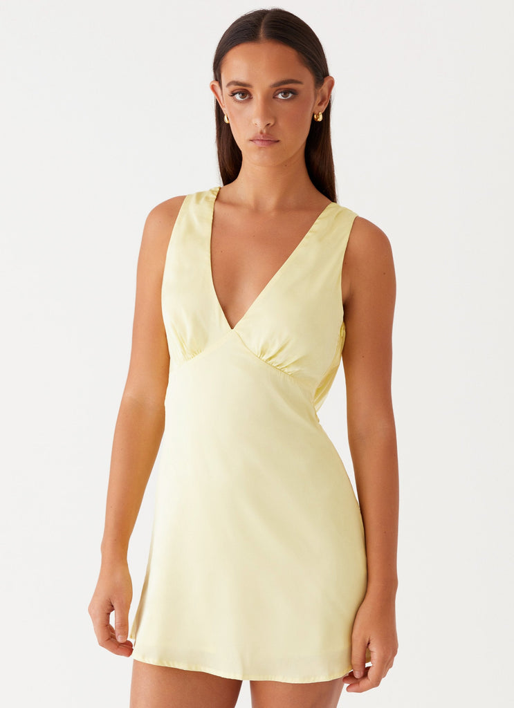 Womens Veena Satin Mini Dress in the colour Yellow in front of a light grey background