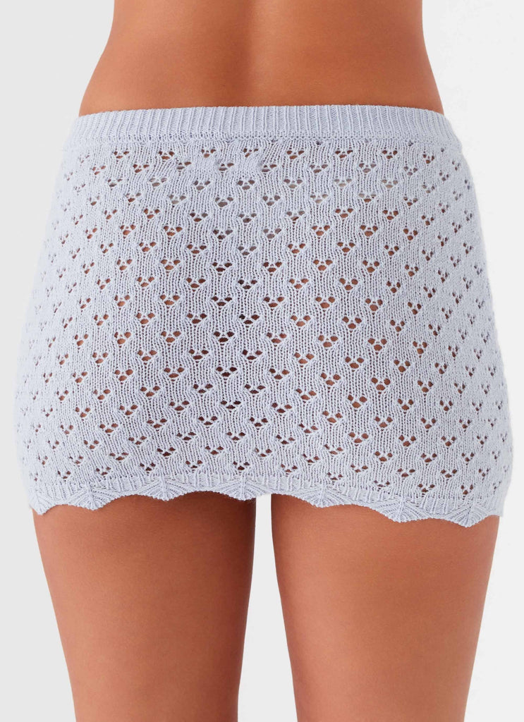 Womens Blue Bird Knit Mini Skirt in the colour Blue Dusk in front of a light grey background