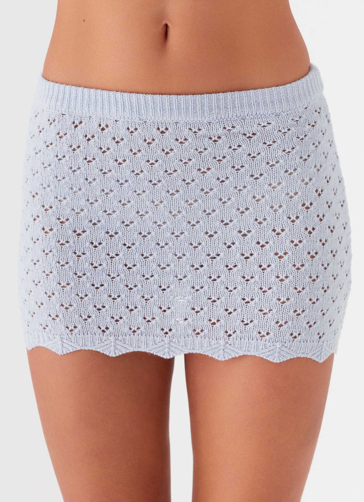 Womens Blue Bird Knit Mini Skirt in the colour Blue Dusk in front of a light grey background