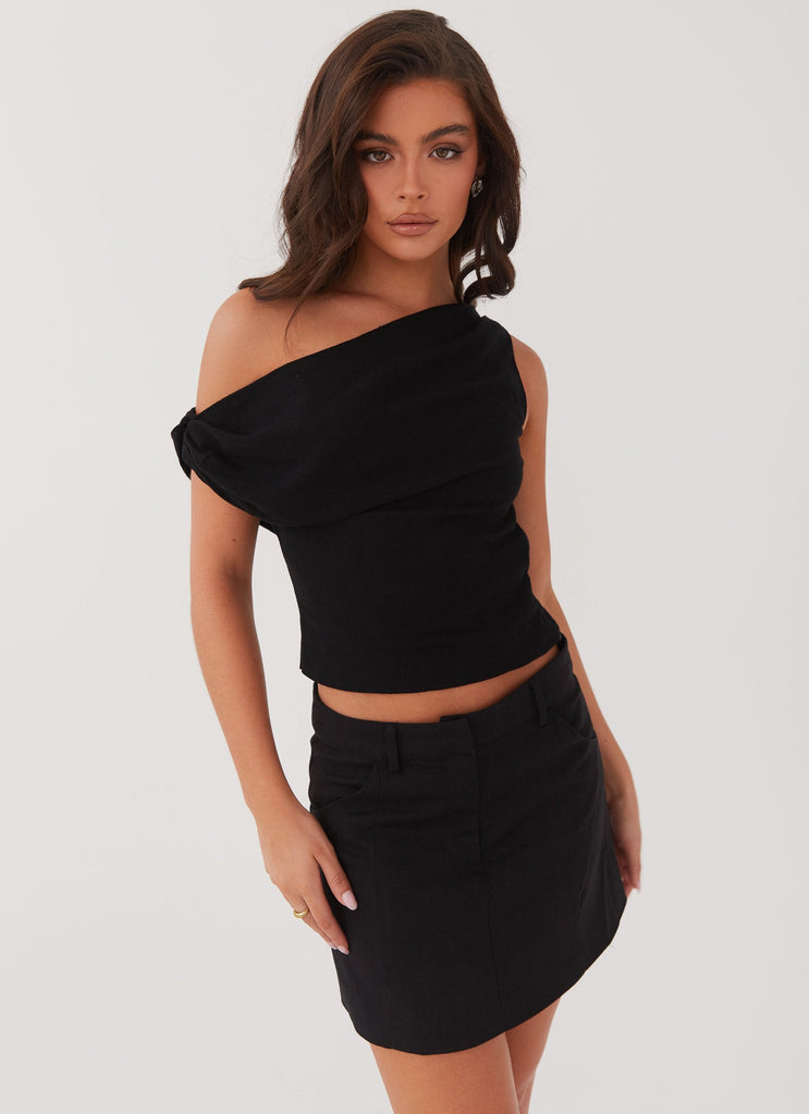 Womens Marissa Linen One Shoulder Top in the colour Black in front of a light grey background