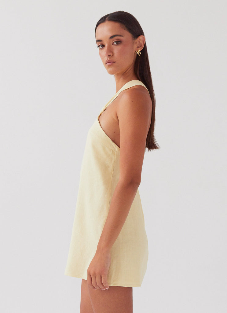 Womens Keira Linen Mini Dress in the colour Lemon in front of a light grey background