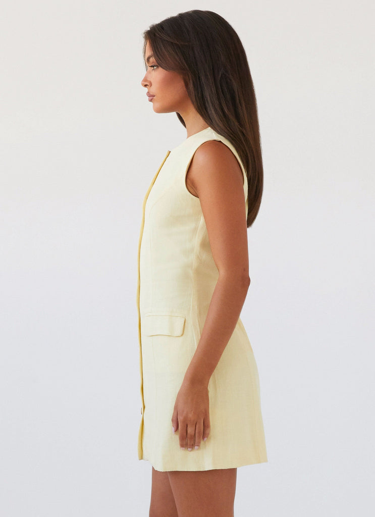 Womens Castello Fiore Linen Mini Dress in the colour Lemon in front of a light grey background