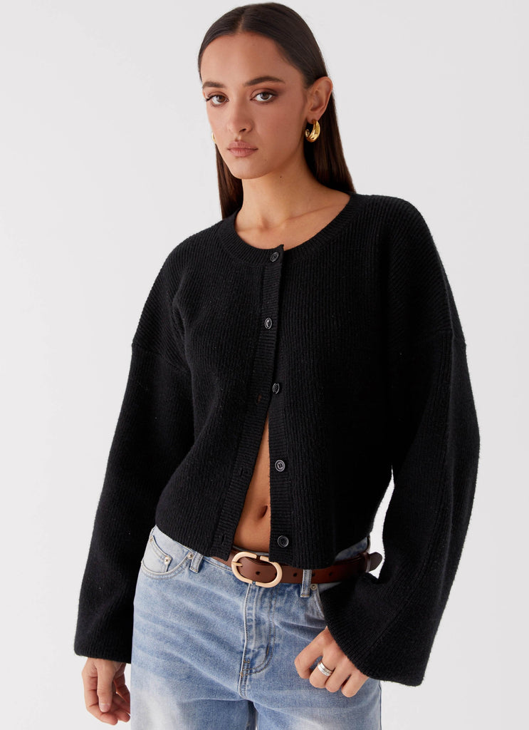 Womens Daphne Knit Cardigan in the colour Black in front of a light grey background