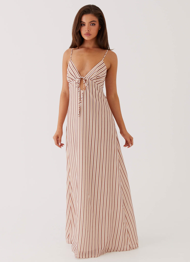 Womens Flora Linen Maxi Dress in the colour Passionfruit Stripe in front of a light grey background