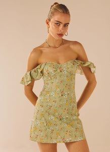 Womens The Chateau Mini Dress in the colour Sage Floral in front of a light grey background